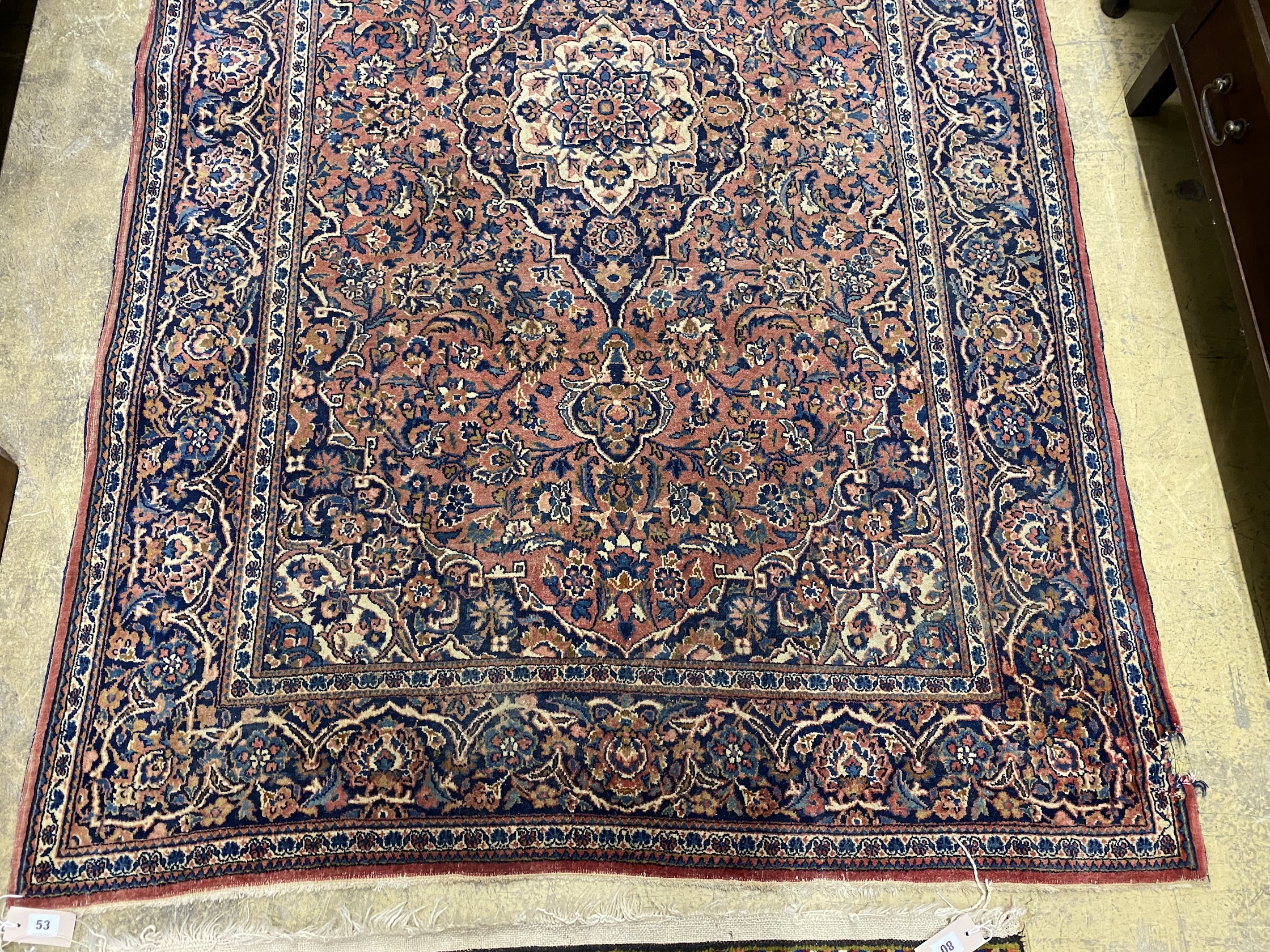 An Isphahan red ground rug, 206 x 133cm together with a Bokhara red ground runner